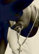 Puff Daddy wearing Stellar Jewelry White Gold Chain & Cross